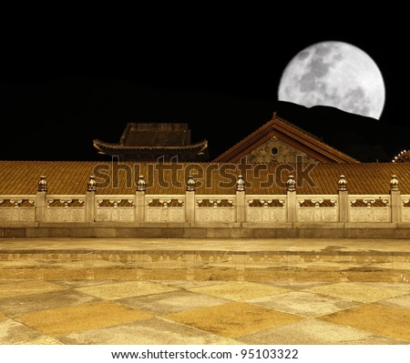 The terrace of an ancient Chinese golden marble palace courtyard with medieval stone carving ornate railings overseeing a Chinese ornamental palace roof and a full moon.