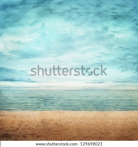 Abstract nature summer or spring ocean sea background. Small waves on water surface in motion blur with bokeh lights from sunrise.