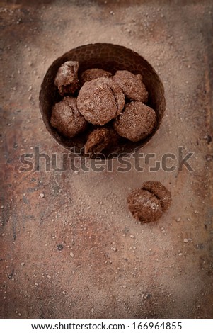 Chocolate truffles. Vintage food dessert with cocoa and nuts