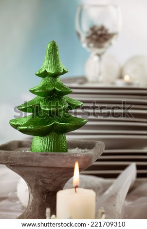 Christmas table setting. Restaurant place setting in elegant holiday style with xmas ornaments