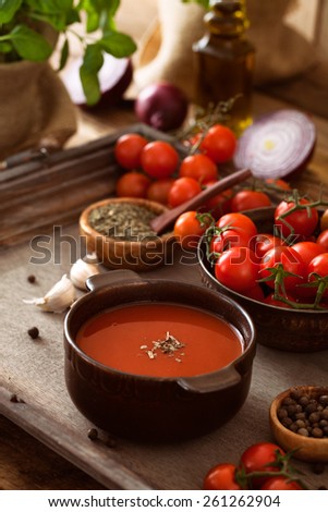 Tomato soup. Homemade tomato soup with tomatoes, herbs and spices. Comfort food.
