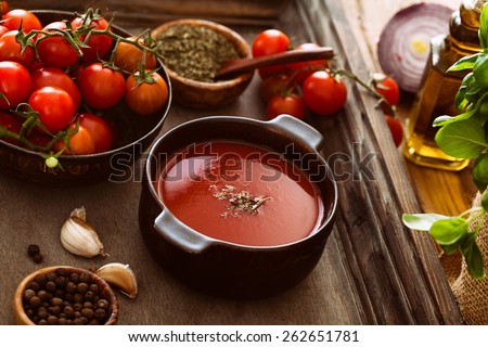 Tomato soup. Homemade tomato soup with tomatoes, herbs and spices. Comfort food.