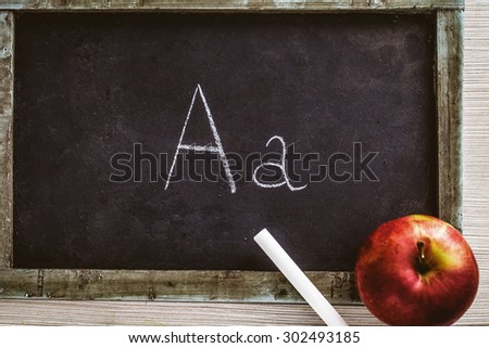 Back to school concept. Apple and chalkboard. Copy space