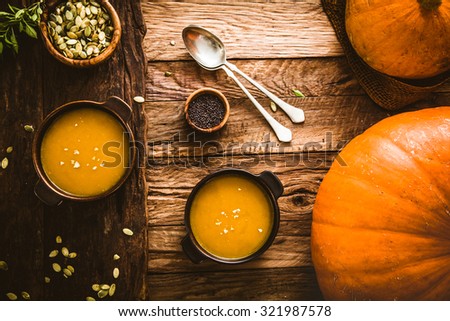 Thanksgiving dinner. Pumpkin soup. Autumn dinner with healthy vegetable soup