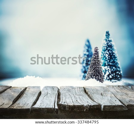 Christmas background. Xmas fir tree on snow. Empty winter display for your montage