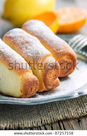 Delicious jam rolls. Baked pastry filled with fruit marmalade.