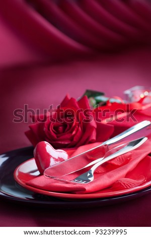 Valentine' day dinner with table setting in red and