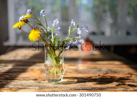 still life/flowers in the cup/bouquet of flowers