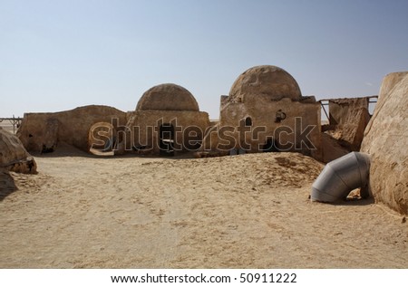 SAHARA, TUNISIA - OCT 18: Abandoned sets for the shooting of the movie Star Wars in the Sahara desert on a background of sand dunes on October 18, 2008 in Sahara, Tunisia