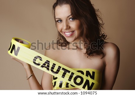 Nude female with breasts covered by yellow \