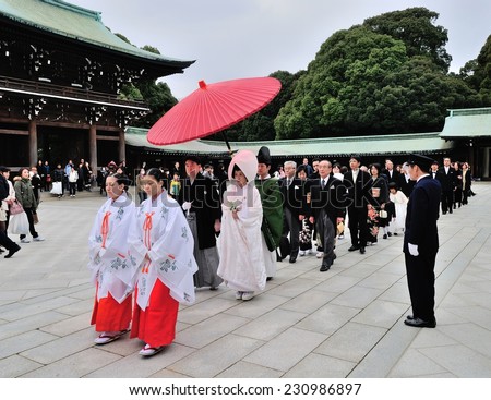 TOKYO, JAPAN -?? October 28th 2014: A traditional Japanese wedding ceremony at Shrine. Wedding parties and family members parade through the inner ground of the Meiji Jingu Shrine.