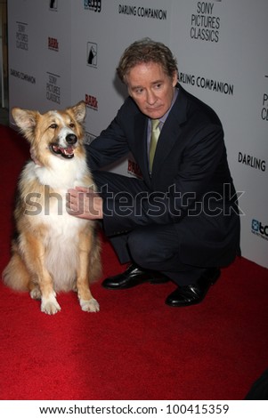 LOS ANGELES - APR 17:  Kevin Kline with Kasey (the dog was Freeway in the movie) arrives at the 