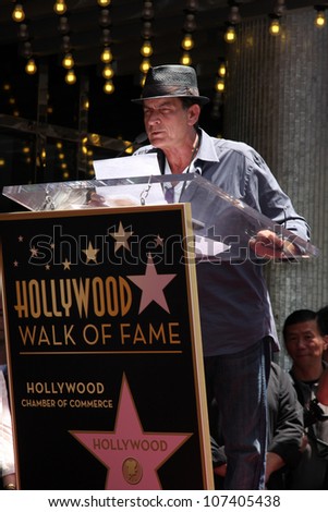 LOS ANGELES - JUL 9:  Charlie Sheen at the Hollywood Walk of Fame Ceremony for Slash at Hard Rock Cafe at Hollywood & Highland on July 9, 2012 in Los Angeles, CA