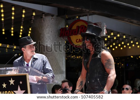 LOS ANGELES - JUL 9:  Charlie Sheen, Slash at the Hollywood Walk of Fame Ceremony for Slash at Hard Rock Cafe at Hollywood & Highland on July 9, 2012 in Los Angeles, CA