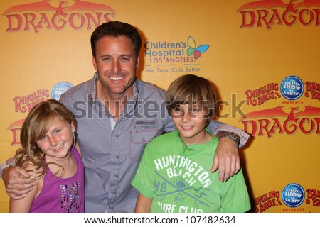 LOS ANGELES - JUL 12:  Chris Harrison, and his children arrives at \'Dragons\' presented by Ringling Bros. & Barnum & Bailey Circus at Staples Center on July 12, 2012 in Los Angeles, CA