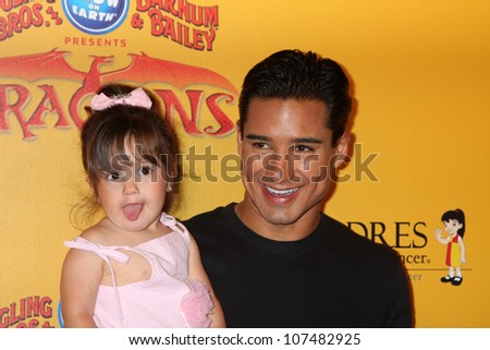 LOS ANGELES - JUL 12:  Mario Lopez and daughter arrives at 'Dragons' presented by Ringling Bros. & Barnum & Bailey Circus at Staples Center on July 12, 2012 in Los Angeles, CA