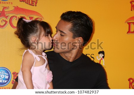 LOS ANGELES - JUL 12:  Mario Lopez and daughter arrives at \'Dragons\' presented by Ringling Bros. & Barnum & Bailey Circus at Staples Center on July 12, 2012 in Los Angeles, CA