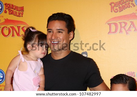 LOS ANGELES - JUL 12:  Mario Lopez and daughter arrives at \'Dragons\' presented by Ringling Bros. & Barnum & Bailey Circus at Staples Center on July 12, 2012 in Los Angeles, CA