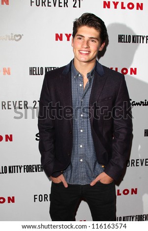 LOS ANGELES - OCT 15:  Gregg Sulkin arrives at  Nylon\'s October IT Issue party at London West Hollywood on October 15, 2012 in Los Angeles, CA