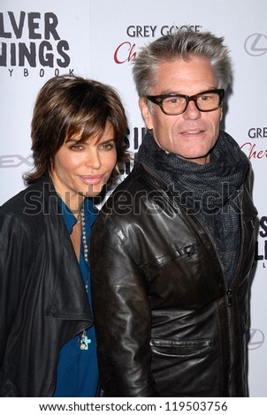 LOS ANGELES - NOV 19:  Lisa Rinna, Harry Hamlin arrives to the \'Silver Linings Playbook\' LA Premiere at Academy of Motion Picture Arts and Sciences on November 19, 2012 in Beverly Hills, CA