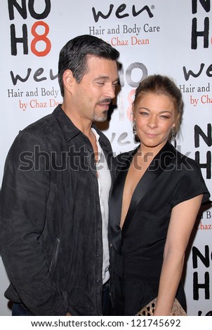LOS ANGELES - DEC 12:  Eddie Cibrian, LeAnn Rimes arrive to the NOH8 4th Anniversary Party at Avalon on December 12, 2012 in Los Angeles, CA