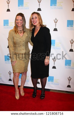 LOS ANGELES - DEC 12:  Maria Bell, Genie Francis arrive at the 14th Annual Women\'s Image Network Awards at Paramount Theater on December 12, 2012 in Los Angeles, CA