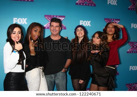 .LOS ANGELES - DEC 17:  Fifth Harmony, Simon Cowell at the \'X Factor\' Season Finale Press Conference at CBS Television City on December 17, 2012 in Los Angeles, CA
