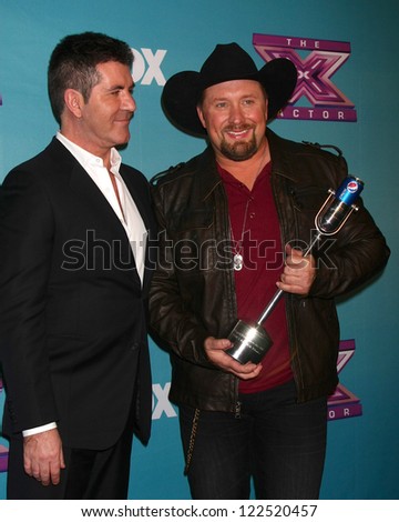 LOS ANGELES - DEC 20:  Simon Cowell, Tate Stevens - Winner of 2012 X Factor at the \'X Factor\' Season Finale at CBS Television City on December 20, 2012 in Los Angeles, CA