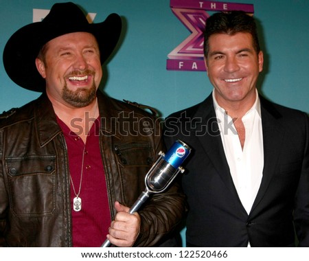 LOS ANGELES - DEC 20:  Tate Stevens - Winner of 2012 X Factor, Simon Cowell at the \'X Factor\' Season Finale at CBS Television City on December 20, 2012 in Los Angeles, CA