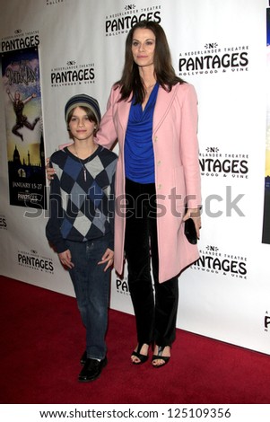 LOS ANGELES - JAN 15:  Jennifer Taylor, son Jake arrives at the opening night of \'Peter Pan\' at Pantages Theater on January 15, 2013 in Los Angeles, CA