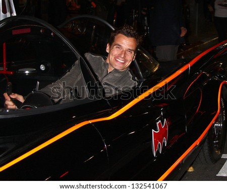 LOS ANGELES - MAR 21:  Antonio Sabato Jr. in the Batmobile at the Batman Product Line Launch at the Meltdown Comics on March 21, 2013 in Los Angeles, CA
