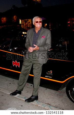 LOS ANGELES - MAR 21:  Adam West poses with the Batmobile at the Batman Product Line Launch at the Meltdown Comics on March 21, 2013 in Los Angeles, CA