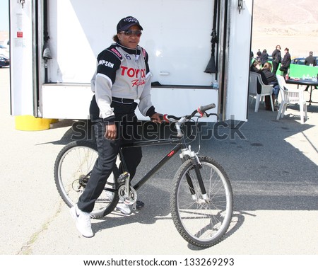 LOS ANGELES - MAR 23:  Wanda Sykes using the community bike at the 37th Annual Toyota Pro/Celebrity Race training at the Willow Springs International Speedway on March 23, 2013 in Rosamond, CA