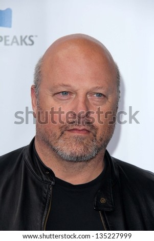 LOS ANGELES - APR 13:  Michael Chiklis arrives at the Light Up The Blues Concert Benefitting Autism Speaks at the Club Nokia on April 13, 2013 in Los Angeles, CA