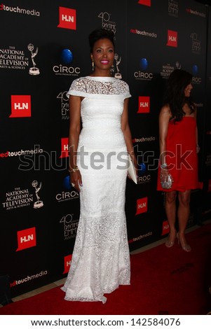 LOS ANGELES - JUN 16:  Aisha Tyler arrives at the 40th Daytime Emmy Awards at the Skirball Cultural Center on June 16, 2013 in Los Angeles, CA