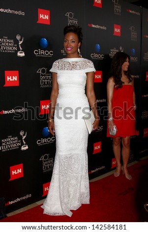LOS ANGELES - JUN 16:  Aisha Tyler arrives at the 40th Daytime Emmy Awards at the Skirball Cultural Center on June 16, 2013 in Los Angeles, CA