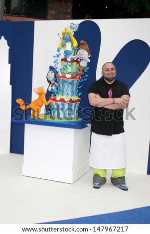 LOS ANGELES - JUL 28:  Duff Goldman with the Smurfs 2 cake by Charm City Cakes arrives at the \