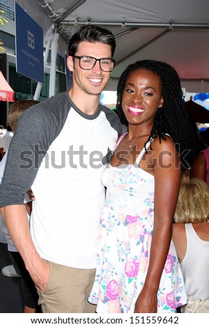 LOS ANGELES - AUG 23:  Adam Gregory, Kristolyn Lloyd at the Bold and Beautiful Fan Meet and Greet at the Farmers Market on August 23, 2013 in Los Angeles, CA