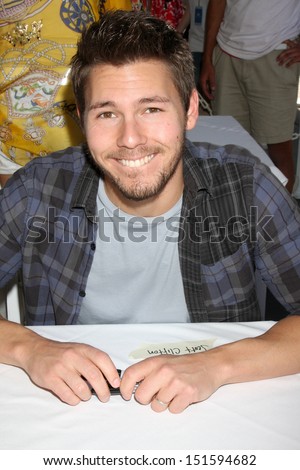 LOS ANGELES - AUG 23:  Scott Clifton at the Bold and Beautiful Fan Meet and Greet at the Farmers Market on August 23, 2013 in Los Angeles, CA