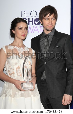 LOS ANGELES - JAN 8:  Adelaide Kane, Torrance Coombs at the People\'s Choice Awards 2014 - Press Room at Nokia at LA Live on January 8, 2014 in Los Angeles, CA
