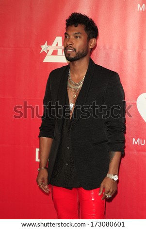 LOS ANGELES - JAN 24:  Miguel at the 2014 MusiCares Person of the Year Gala in honor of Carole King at Los Angeles Convention Center on January 24, 2014 in Los Angeles, CA