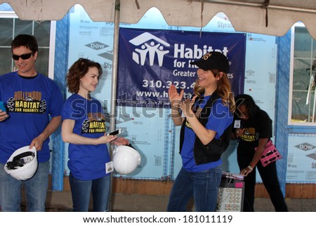 LOS ANGELES - MAR 8:  Rick Hearst, Rebecca Herbst, Lisa LoCicero at the 5th Annual General Hospital Habitat for Humanity Fan Build Day at Private Location on March 8, 2014 in Lynwood, CA