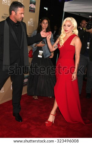 LOS ANGELES - OCT 3:  Taylor Kinney, Lady Gaga at the \