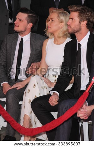 LOS ANGELES - OCT 31:  Josh Hutcherson, Jennifer Lawrence, Liam Hemsworth at the Hunger Games Handprint and Footprint Ceremony at the TCL Chinese Theater on October 31, 2015 in Los Angeles, CA