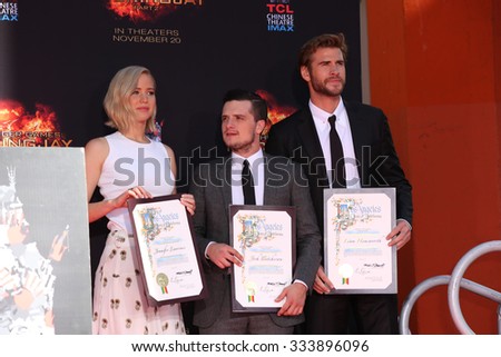LOS ANGELES - OCT 31:  Jennifer Lawrence, Josh Hutcherson, Liam Hemsworth at the Hunger Games Handprint and Footprint Ceremony at the TCL Chinese Theater on October 31, 2015 in Los Angeles, CA