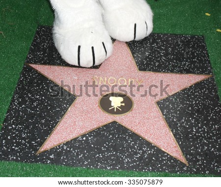 LOS ANGELES - NOV 2:  Snoopy\'s paws with Star at the Snoopy Hollywood Walk of Fame Ceremony at the Hollywood Walk of Fame on November 2, 2015 in Los Angeles, CA