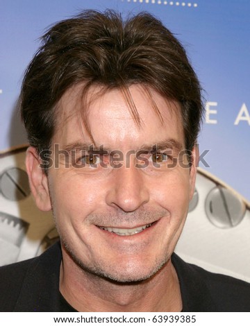 LOS ANGELES FEB 15 Charlie Sheen arrives at the Omegamania-Antiquor um Cocktail Reception at Regent Beverly Wilshire Hotel on February 15 2007 in Beverly Hills CA. LOS ANGELES FEB 15 Charlie Sheen arrives at the Omegamania-Antiquor um Cocktail Reception at Regent Beverly Wilshire Hotel on February 15 2007 in Beverly Hills CA.