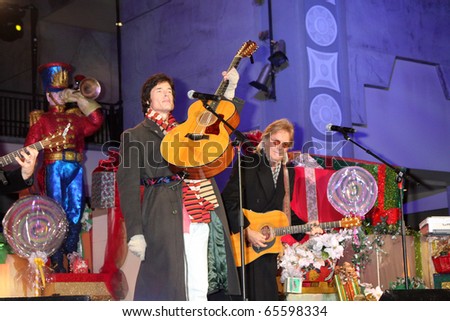 LOS ANGELES - NOV 20:  Ronn Moss, Peter Beckett -  Player at the Hollywood & Highland Tree Lighting Concert 2010  at Hollywood & Highland Center Cour on November 20, 2010 in Los Angeles, CA