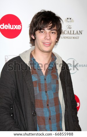 LOS ANGELES - DEC 7:  Devon Bostick arrives at the Junior Hollywood Radio and Television Society 8th Annual Young Hollywood Holiday Party at Voyeur on December 7, 2010 in West Hollywood, CA.