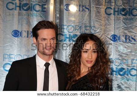 stock photo LOS ANGELES JAN 5 Shane West Maggie Q arrive at